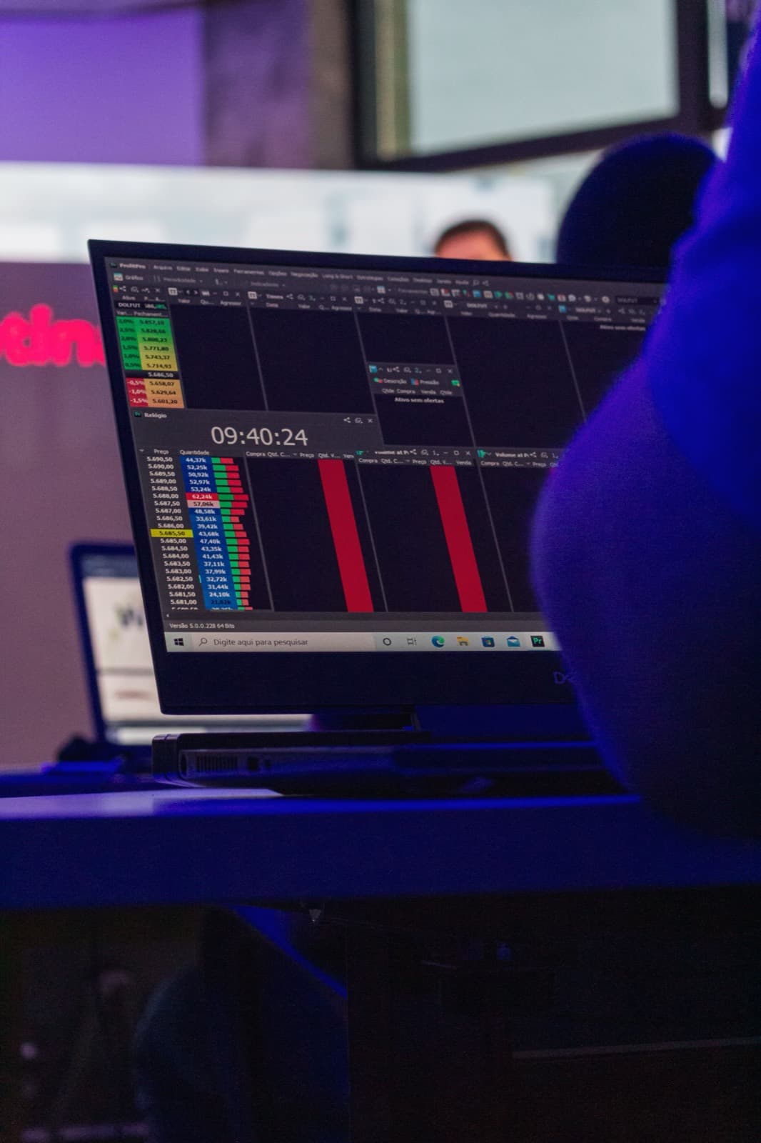 A person analyzing extracted data on a laptop screen